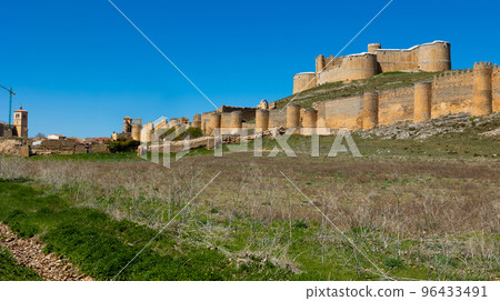 Dilapidated medieval fortress of Berlanga de Duero on hill, Spain Dilapidated medieval fortress of Berlanga de Duero on hill, Spain 96433491