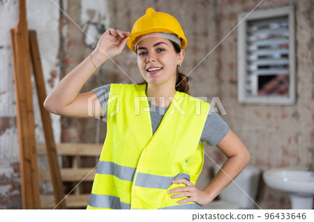 Portrait of smiling young woman engineer 96433646