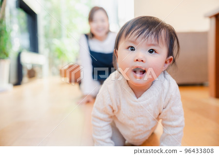 babysitter taking care of baby 96433808