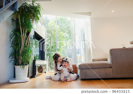 babysitter taking care of baby 96433815