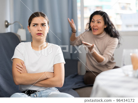 Young female couple quarreling at home 96434172