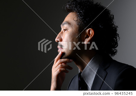 A middle-aged man in a suit that can be used for the beauty of a beard and the image of a manager A middle-aged man in a suit that can be used for the beauty of a beard and the image of a manager 96435245