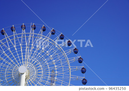 Ferris wheel and blue sky Ferris wheel and blue sky 96435250