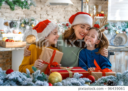 family celebrating Christmas 96439061