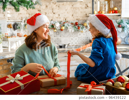 family preparing for Christmas 96439122