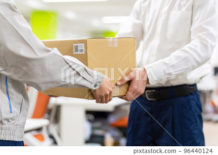 worker who delivers luggage worker who delivers luggage 96440124