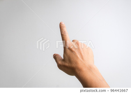 Male hand with index finger pointing to something. Male hand with index finger pointing to something. 96441667