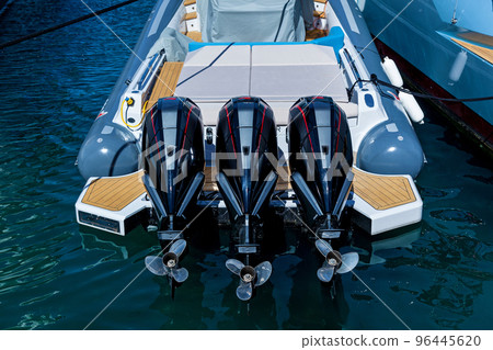 Three powerful outboard motors Three powerful outboard motors 96445620