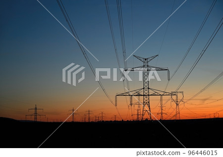 High voltage pylons. Rising energy prices - a concept for industry and energy. Increasing the price of electricity. Concept for industry and energy. The crisis in Europe caused by Russian aggression 96446015