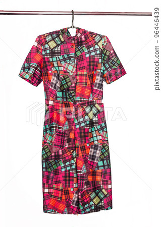 Elegant midi dress with abstract geometric colored pattern, isolated on white background Elegant midi dress with abstract geometric colored pattern, isolated on white background 96446439