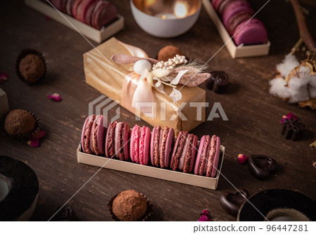 Sweet gift box of pink macarons Sweet gift box of pink macarons 96447281