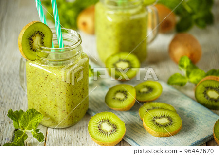Kiwi smoothie with fresh fruits 96447670