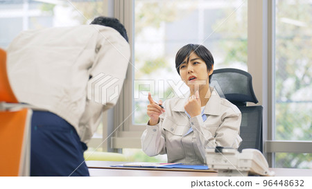 Boss wearing work clothes preaching in the office 96448632