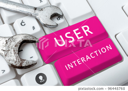 Text sign showing User Interaction. Word Written on how the customer acts on the system and vice versa Text sign showing User Interaction. Word Written on how the customer acts on the system and vice versa 96448768