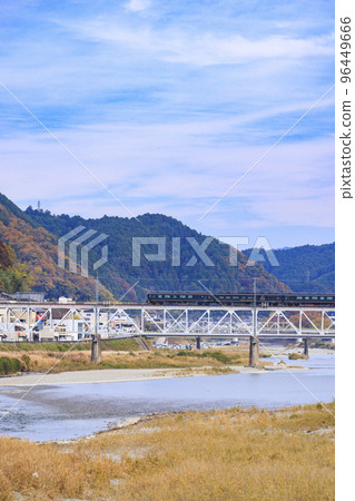 A blue symphony running in the clear autumn weather 96449666