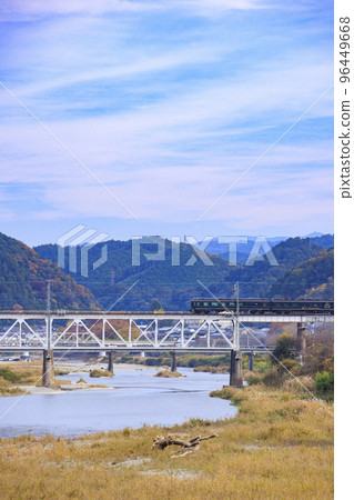 A blue symphony running in the clear autumn weather 96449668
