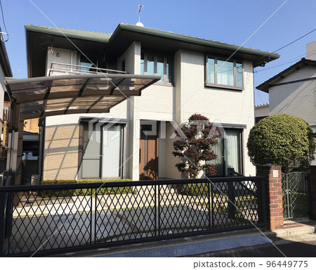 Detached house with a small garden and carport perming photo material 96449775