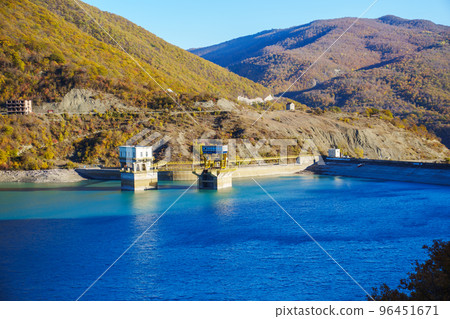 mountain landscape. beautiful blue lake reservoir among the mountains. mountain landscape. beautiful blue lake reservoir among the mountains. 96451671