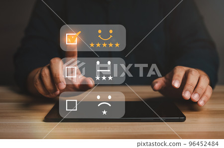 Businessman gives ratings to service experience on a smartphone, Service Provider Satisfaction Ratings and Evaluations, Satisfaction concept and Customer service Businessman gives ratings to service experience on a smartphone, Service Provider Satisfaction Ratings and Evaluations, Satisfaction concept and Customer service 96452484