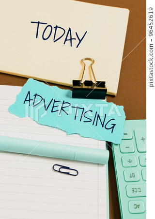 Conceptual caption Advertising. Conceptual photo action of calling attention of the public by paid announcements Conceptual caption Advertising. Conceptual photo action of calling attention of the public by paid announcements 96452619