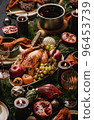 Christmas dinner festive table setting over black 96453739