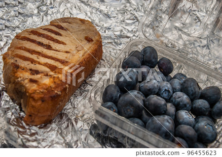 Grilled Pork and Black Grapes On foil Grilled Pork and Black Grapes On foil 96455623
