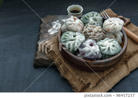 Chinese chives Dumplings Mixed Color or Garlic Chives Dim Sum Rice Cake inside with Taro Slice ,Bamboo shoot and Many kind of vegetable inside the flour, Steamed Served Sweet Black Soy Sauce Chinese Chinese chives Dumplings Mixed Color or Garlic Chives Dim Sum Rice Cake inside with Taro Slice ,Bamboo shoot and Many kind of vegetable inside the flour, Steamed Served Sweet Black Soy Sauce Chinese 96457237