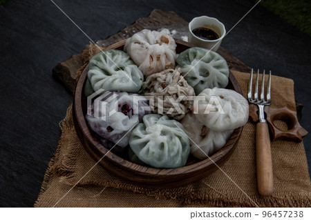 Chinese chives Dumplings Mixed Color or Garlic Chives Dim Sum Rice Cake inside with Taro Slice ,Bamboo shoot and Many kind of vegetable inside the flour, Steamed Served Sweet Black Soy Sauce Chinese Chinese chives Dumplings Mixed Color or Garlic Chives Dim Sum Rice Cake inside with Taro Slice ,Bamboo shoot and Many kind of vegetable inside the flour, Steamed Served Sweet Black Soy Sauce Chinese 96457238