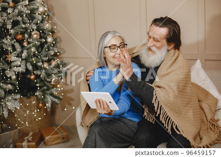 Age and people concept . Senior couple at home. People with tablet. 96459157