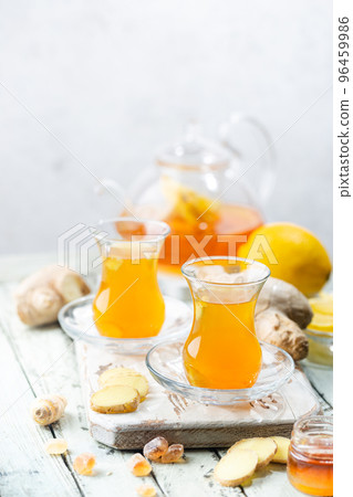 Ginger tea in a glass cup 96459986