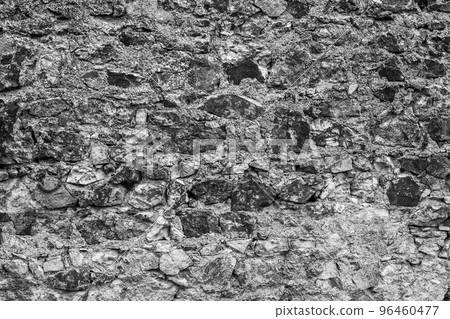 Old stone castle wall black and white texture. Old stone castle wall black and white texture. 96460477