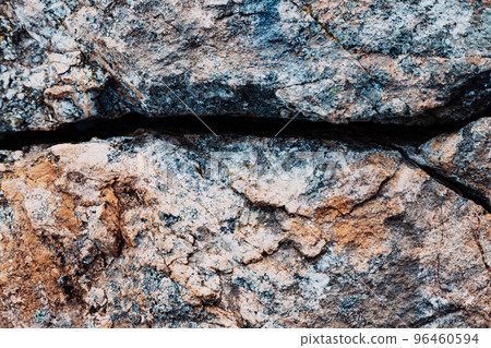Crack in the rock on mountain in various colors. 96460594
