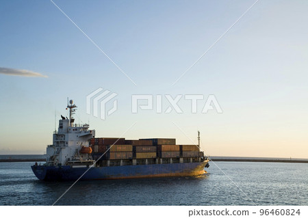 The container ship is leaving the Port of Kaohsiung, Taiwan. 96460824