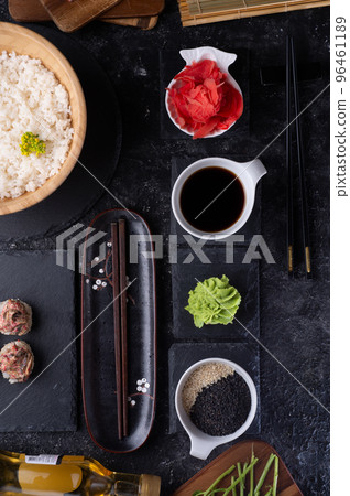 set for  sushi   served  at black dish at black table. flat lay 96461189