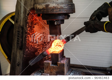 Red hot iron in the vise 96461463