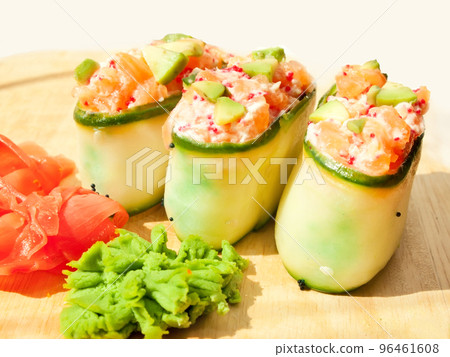 Fresh cucumber sushi with  salmon and avakado 96461608