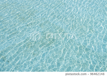 Water ripples on the surface of the pond as a background. Water ripples on the surface of the pond as a background. 96462148