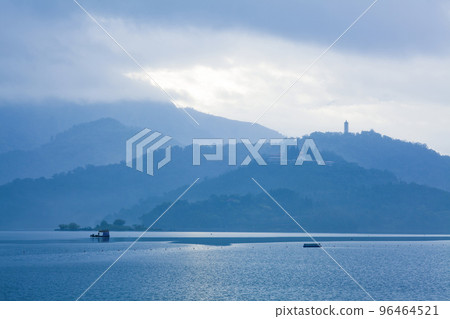 The morning mist scenery of Sun Moon Lake is a famous attraction in Nantou, Taiwan. 96464521