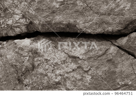 Crack in the rock on mountain sepia tone. 96464751