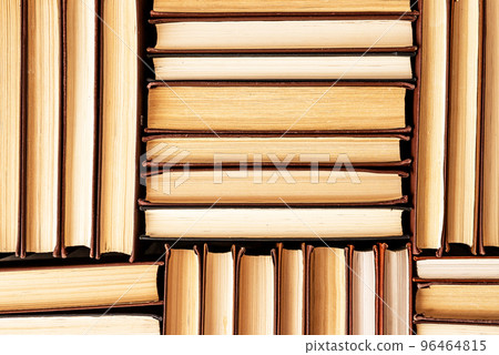 Hardback books heap in library, bookstore. Reading, education concept. Literature background. 96464815
