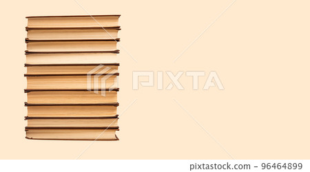 Banner with books stack on pastel background. Tall tower of hardback novels. Education, wisdom concept. Place for text Banner with books stack on pastel background. Tall tower of hardback novels. Education, wisdom concept. Place for text 96464899