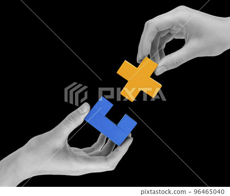 Two hands connecting puzzle pieces. Partnership, teamwork, connection, collaboration concept. Business solution, success. Two hands connecting puzzle pieces. Partnership, teamwork, connection, collaboration concept. Business solution, success. 96465040