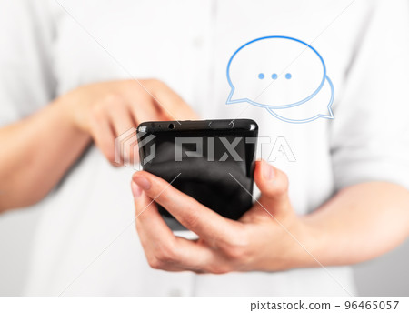 Sending online message, sms, texting using mobile phone Sending online message, sms, texting using mobile phone 96465057