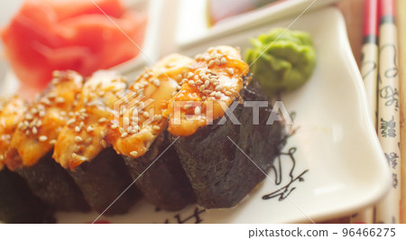 hot sushi with roe and chopsticks hot sushi with roe and chopsticks 96466275