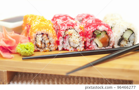set of sushi with roe and chopsticks set of sushi with roe and chopsticks 96466277