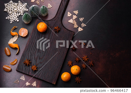 Beautiful Christmas decorations with holiday toys, clementines and gingerbread Beautiful Christmas decorations with holiday toys, clementines and gingerbread 96466417