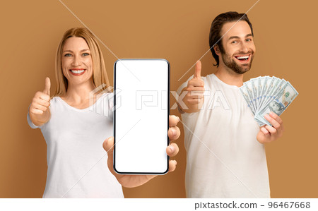 Happy positive couple enjoying prize, gambling online, mockup Happy positive couple enjoying prize, gambling online, mockup 96467668