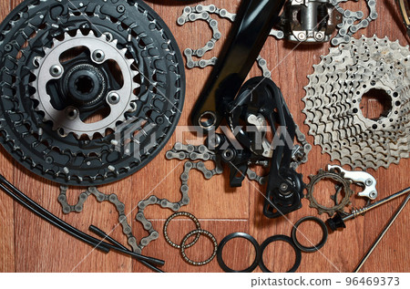 Many different metal parts and components of the running gear of a sports bike 96469373
