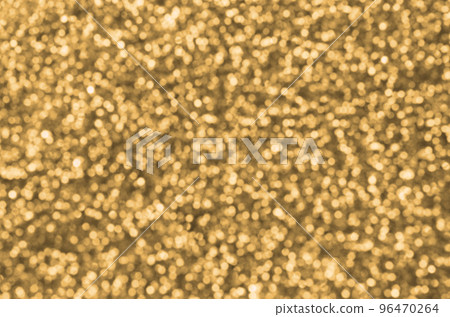 Blurred orange decorative sequins. Background image with shiny bokeh lights from small elements Blurred orange decorative sequins. Background image with shiny bokeh lights from small elements 96470264