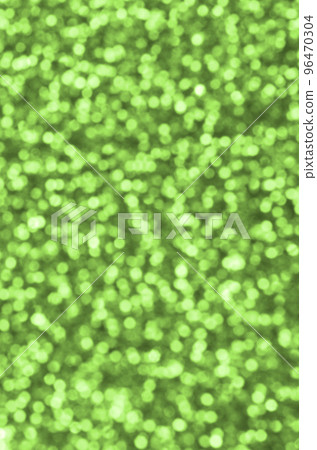 Blurred lime green decorative sequins. Background image with shiny bokeh lights from small elements 96470304